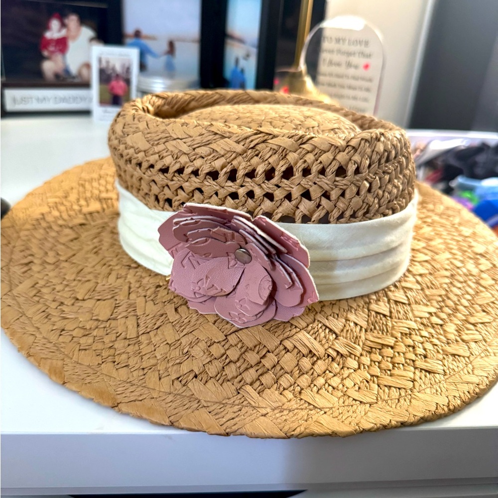 Elegant Tan Straw Hat with Pink Flower Accent
